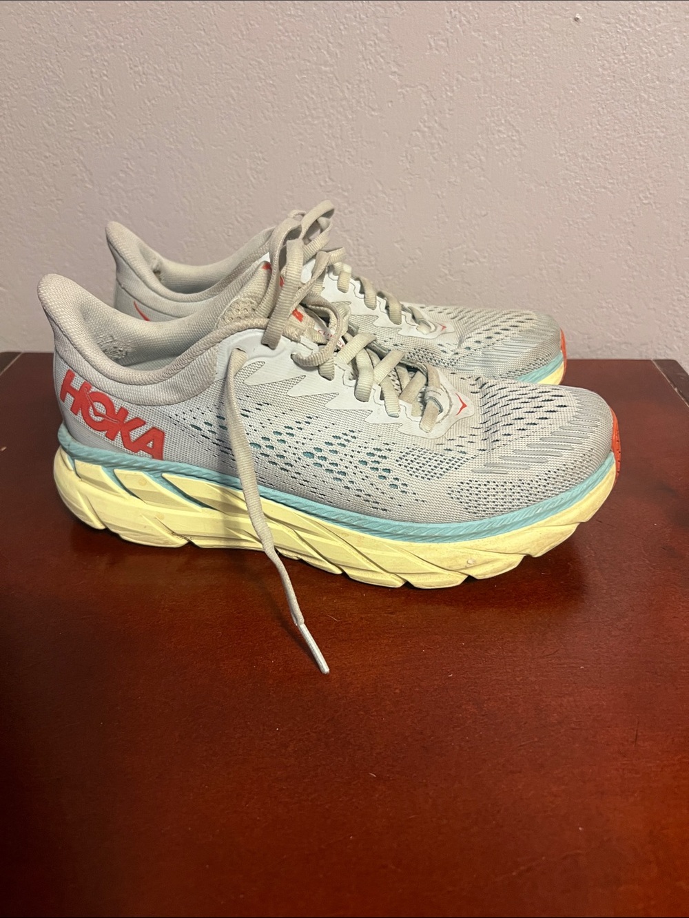 Hoka Women's Light Gray Running Shoes with Yellow Sole and Teal Accents